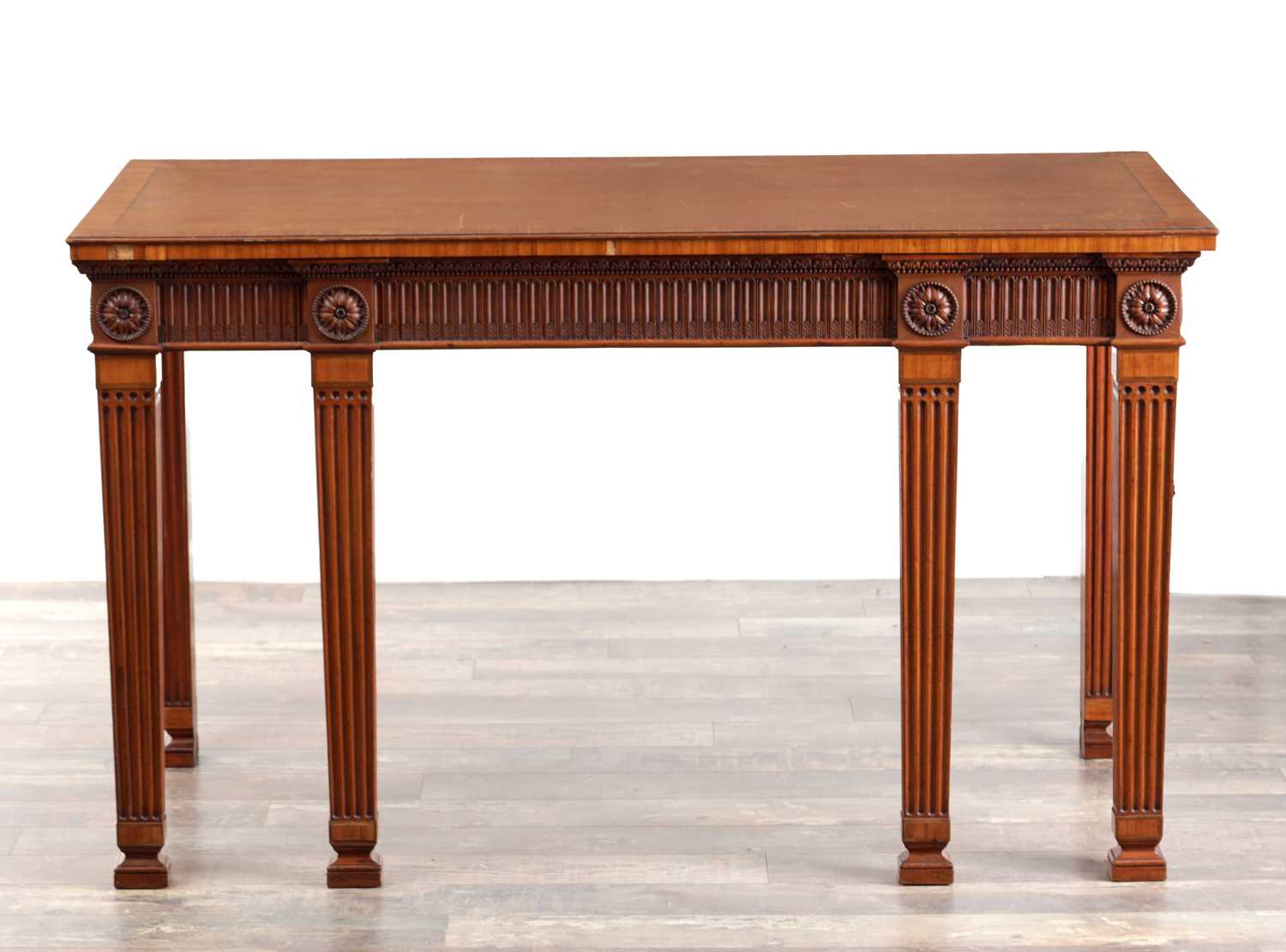 Lot 1152 - IN THE MANNER OF SIR WILLIAM CHAMBERS (1723–1796) CIRCA 1775 A GEORGE III FUSTIC, PADOUK CROSSBANDED AND MARQUETRY SIDE TABLE