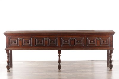 Lot 1241 - A LATE 17TH CENTURY WILLIAM AND MARY FOUR DRAWER MOULDED OAK DRESSER BASE