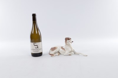 Lot 136 - A NYMPHENBURG PORCELAIN BORZOI DOG PORCELAIN FIGURINE
