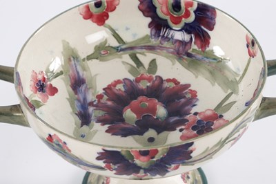 Lot 22 - AN EARLY 20TH CENTURY MOORCROFT TWO HANDLED FOOTED BOWL