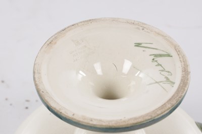 Lot 22 - AN EARLY 20TH CENTURY MOORCROFT TWO HANDLED FOOTED BOWL