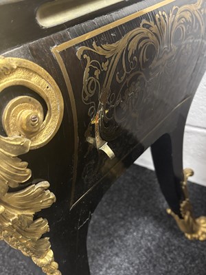 Lot 1193 - IN THE MANNER OF ANDRE-CHARLES BOULLE (1642-1732) A REGENCY FRENCH ORMOLU MOUNTED BOULLE EBONY VENEERED FRENCH COMMODE