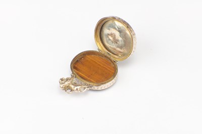 Lot 196 - A ROLLED GOLD TIGER EYE LOCKET