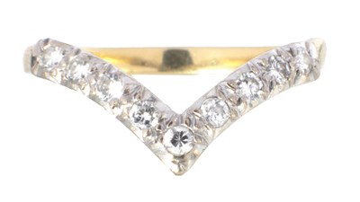Lot 281 - AN 18CT GOLD AND ENAMEL DIAMOND WISHBONE RING