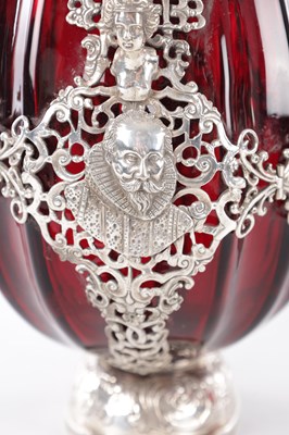 Lot 1 - A PAIR OF LATE 19TH CENTURY CONTINENTAL RUBY GLASS PILGRIM FLASKS WITH SILVER MOUNTS