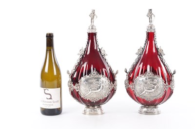 Lot 1 - A PAIR OF LATE 19TH CENTURY CONTINENTAL RUBY GLASS PILGRIM FLASKS WITH SILVER MOUNTS