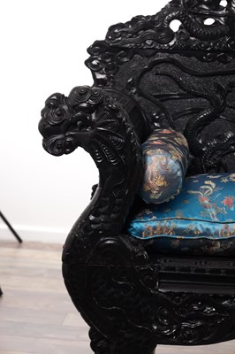 Lot 73 - A LATE 19TH CENTURY CARVED HARDWOOD EBONISED CHINESE SETTEE