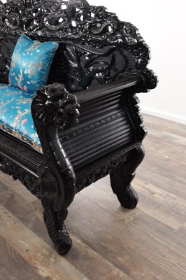 Lot 73 - A LATE 19TH CENTURY CARVED HARDWOOD EBONISED CHINESE SETTEE