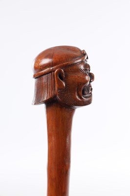 Lot 48 - AN ORIENTAL 19TH CENTURY CARVED WOOD WALKING STICK