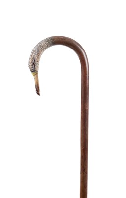 Lot 283 - A 19TH CENTURY CARVED AND PAINTED CROOK HANDLE WALKING STICK IN THE FORM OF A BIRD