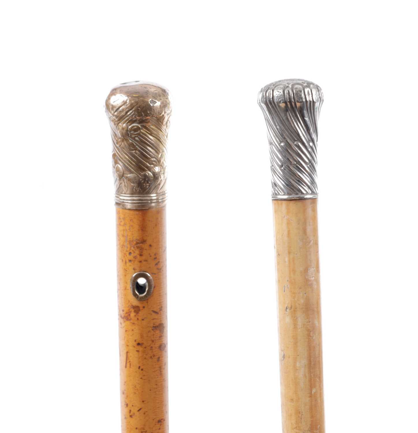 Lot 811 - TWO MALACCA WALKING STICKS
