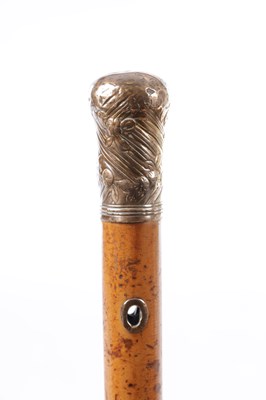 Lot 811 - TWO MALACCA WALKING STICKS