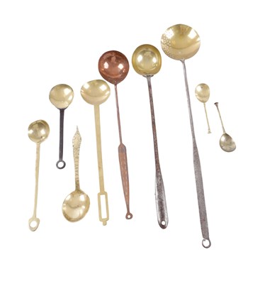 Lot 557 - A COLLECTION OF NINE 16-18TH CENTURY BRASS SPOONS