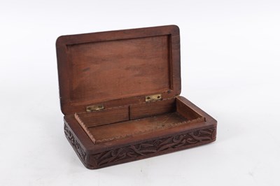 Lot 138 - A 19TH CENTURY EASTERN CARVED HARDWOOD BOX