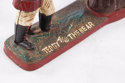 Lot 85 - A CAST IRON MONEY BOX 'TEDDY AND THE BEAR'