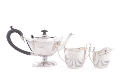 Lot 214 - AN EDWARDIAN SILVER TEA SERVICE