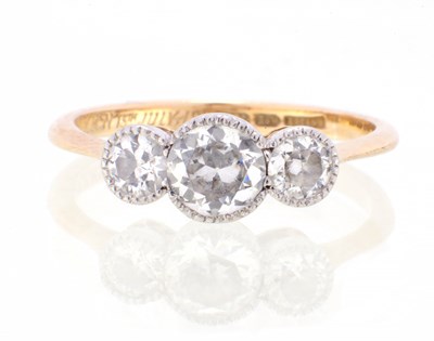 Lot 285 - AN 18CT GOLD DIAMOND TRILOGY RING