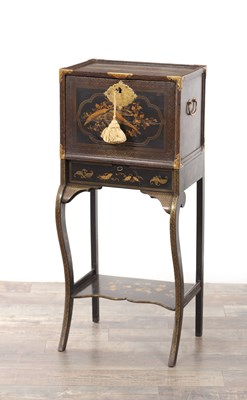 Lot 111 - A 17TH CENTURY JAPANESE LACQUERED CABINET ON EARLY 19TH CENTURY ENGLISH LACQUERED BASE