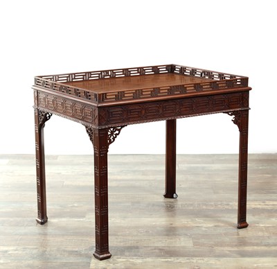 Lot 1300 - A GEORGE III MAHOGANY CHIPPENDALE STYLE SILVER TABLE