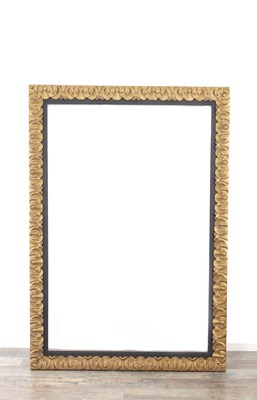 Lot 151 - A LARGE GILT WOOD LEAF CARVED PICTURE FRAME