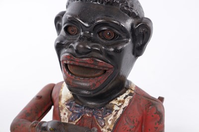 Lot 344 - A LATE 19TH CENTURY PAINTED CAST IRON 'JOLLY' MECHANICAL MONEY BANK
