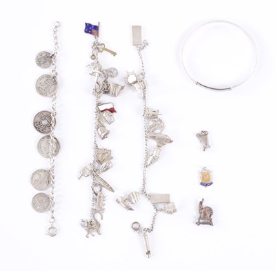 Lot 317 - A COLLECTION OF THREE SILVER BRACELETS AND A BANGLE