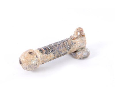 Lot 668 - A POSSIBLY ANCIENT ROMAN GLASS PHALLUS