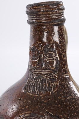 Lot 25 - A 17TH CENTURY RHENISH BELLARMINE JUG