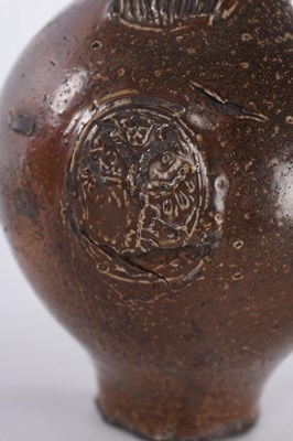 Lot 25 - A 17TH CENTURY RHENISH BELLARMINE JUG