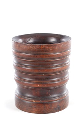 Lot 707 - A 17TH CENTURY ENGLISH LIGNUM VITAE MORTAR AND PESTLE