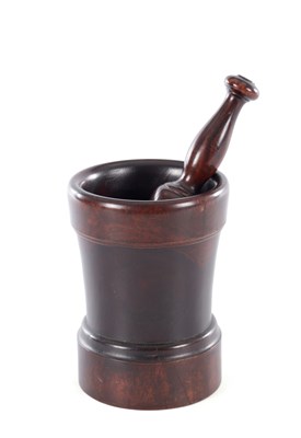 Lot 698 - A 17TH CENTURY ENGLISH LIGNUM VITAE MORTAR AND PESTLE
