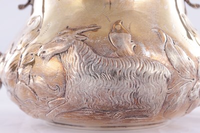 Lot 414 - A CHARLES II STYLE SILVER TWO-HANDLED COVERED PORRINGER