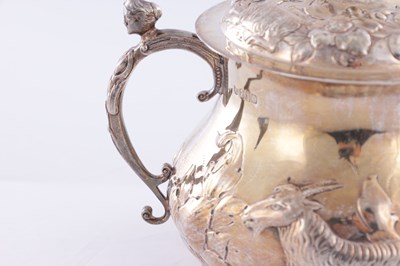 Lot 414 - A CHARLES II STYLE SILVER TWO-HANDLED COVERED PORRINGER