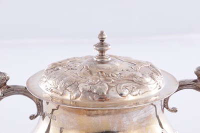Lot 414 - A CHARLES II STYLE SILVER TWO-HANDLED COVERED PORRINGER
