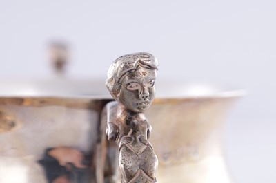 Lot 414 - A CHARLES II STYLE SILVER TWO-HANDLED COVERED PORRINGER
