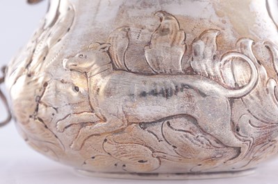 Lot 414 - A CHARLES II STYLE SILVER TWO-HANDLED COVERED PORRINGER
