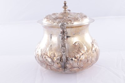 Lot 414 - A CHARLES II STYLE SILVER TWO-HANDLED COVERED PORRINGER