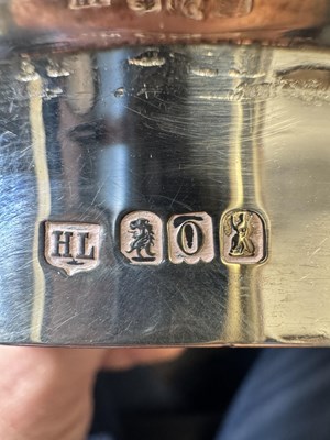 Lot 414 - A CHARLES II STYLE SILVER TWO-HANDLED COVERED PORRINGER