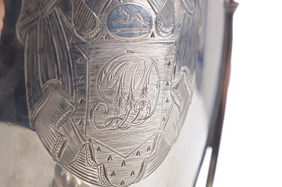 Lot 429 - A GEORGE III SHERATON STYLE SILVER TEA URN