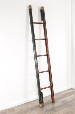 Lot 1127 - A SET OF REGENCY STYLE COUNTRY HOUSE LEATHER BOUND LIBRARY STEPS