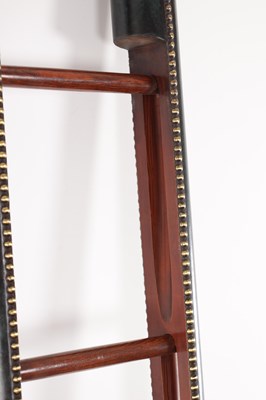 Lot 1127 - A SET OF REGENCY STYLE COUNTRY HOUSE LEATHER BOUND LIBRARY STEPS