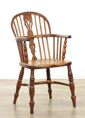 Lot 1254 - AN EARLY 19TH CENTURY YEW WOOD LOW BACK WINDSOR CHAIR
