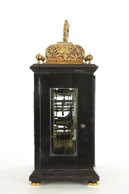 Lot 1119 - WILLIAM SPEAKMAN, LONDON. A GOOD WILLIAM AND MARY EBONY VENEERED BASKET TOP QUARTER STRIKING EIGHT-DAY BRACKET CLOCK