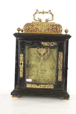 Lot 1119 - WILLIAM SPEAKMAN, LONDON. A GOOD WILLIAM AND MARY EBONY VENEERED BASKET TOP QUARTER STRIKING EIGHT-DAY BRACKET CLOCK