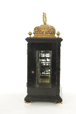 Lot 1119 - WILLIAM SPEAKMAN, LONDON. A GOOD WILLIAM AND MARY EBONY VENEERED BASKET TOP QUARTER STRIKING EIGHT-DAY BRACKET CLOCK
