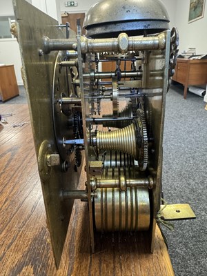 Lot 1119 - WILLIAM SPEAKMAN, LONDON. A GOOD WILLIAM AND MARY EBONY VENEERED BASKET TOP QUARTER STRIKING EIGHT-DAY BRACKET CLOCK