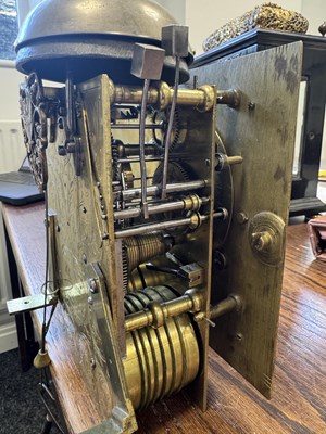 Lot 1119 - WILLIAM SPEAKMAN, LONDON. A GOOD WILLIAM AND MARY EBONY VENEERED BASKET TOP QUARTER STRIKING EIGHT-DAY BRACKET CLOCK