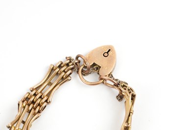 Lot 221 - A 9CT ROSE GOLD HOLD GATE BRACELET WITH LOCKET CLASP