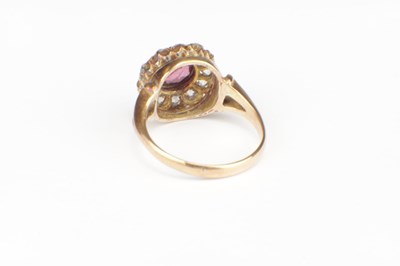 Lot 257 - A RUBY AND DIAMOND 9CT GOLD CLUSTER RING