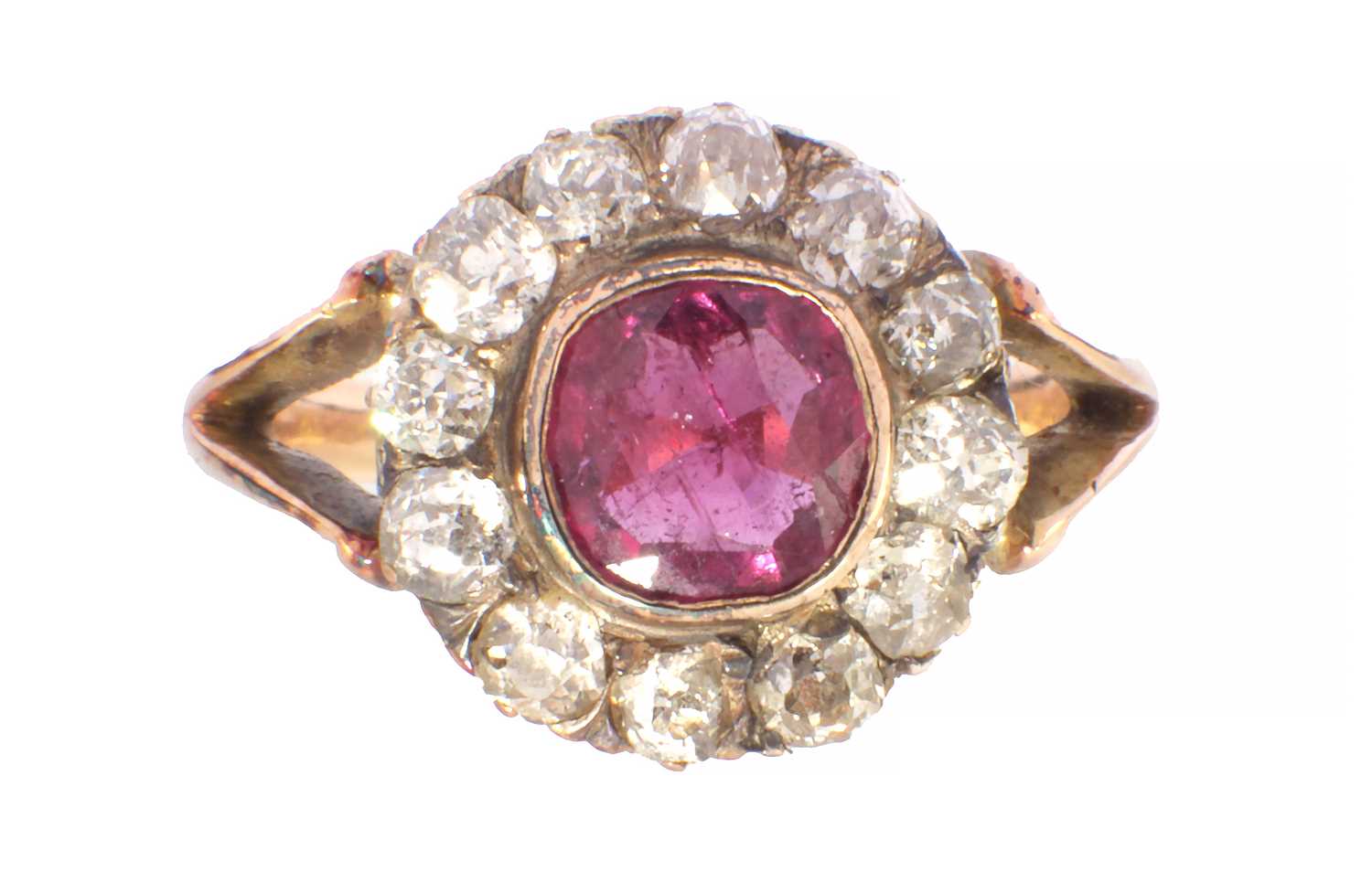 Lot 257 - A RUBY AND DIAMOND 9CT GOLD CLUSTER RING